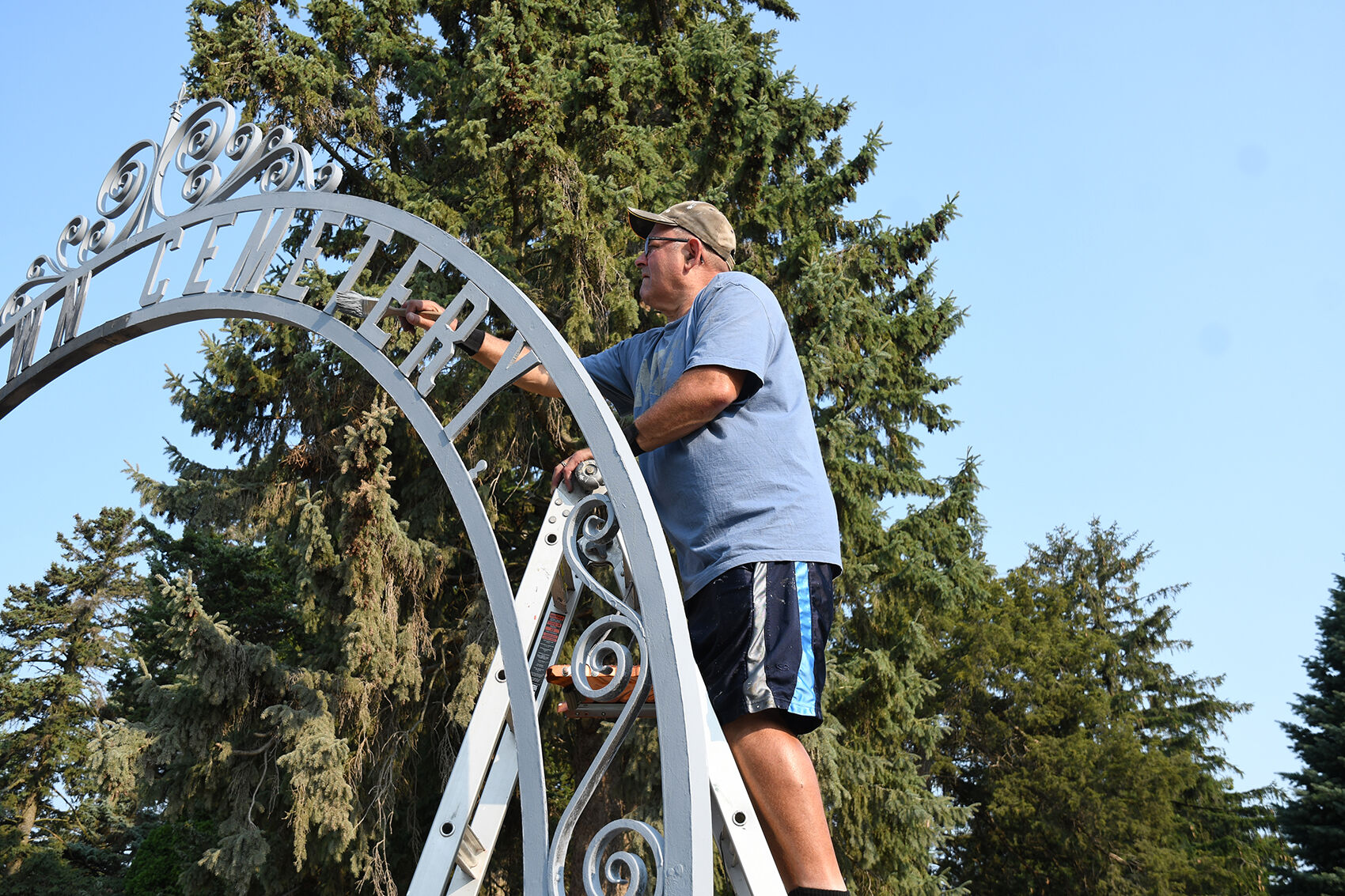 Chuck Johnson repainting archway